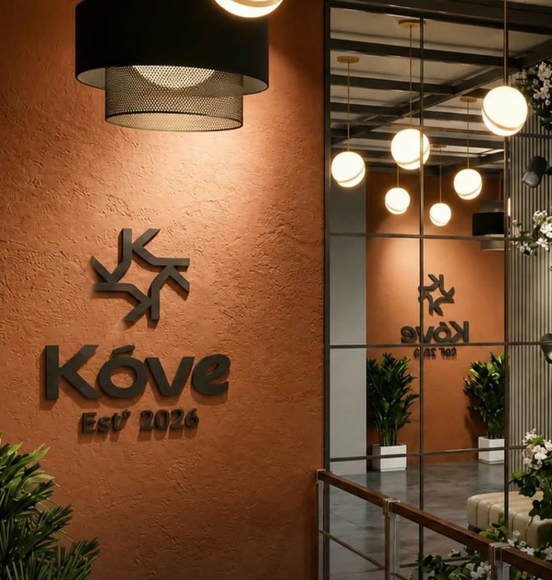 Inside Kóve — signature wall and warm lounge
